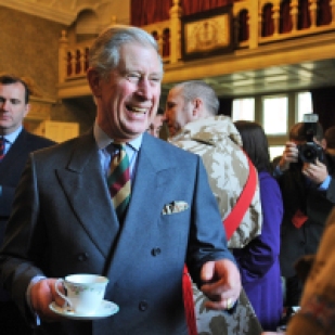 Prince Charles has a cup of tea and a chat with troops at Sandringham.
