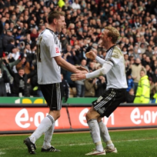 Derby County's Chris Porter and Paul Green celebrate their goal against Watford.